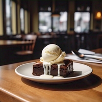 Brownie con bocha de crema americana y charlotte
