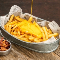 Papas con cheddar